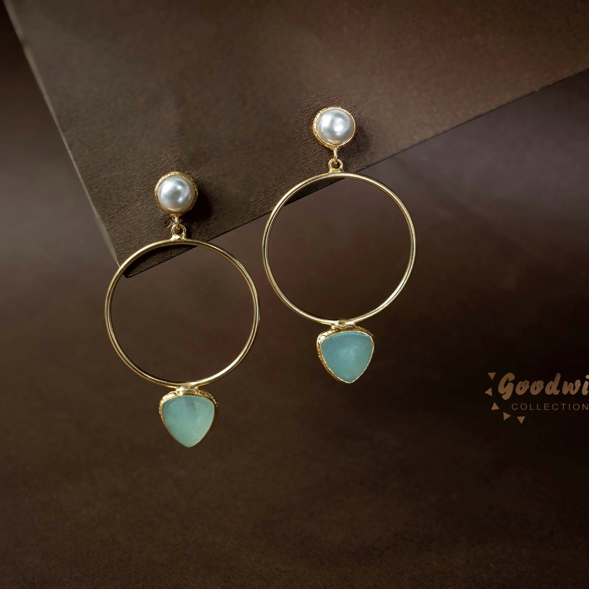 CIRCLE DROP STATEMENT EARRINGS CLRRR